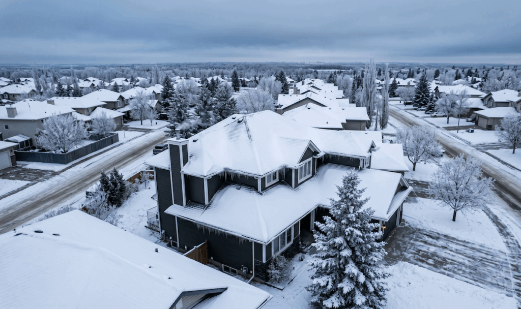 a snow-covered residential rooftop in Edmonton