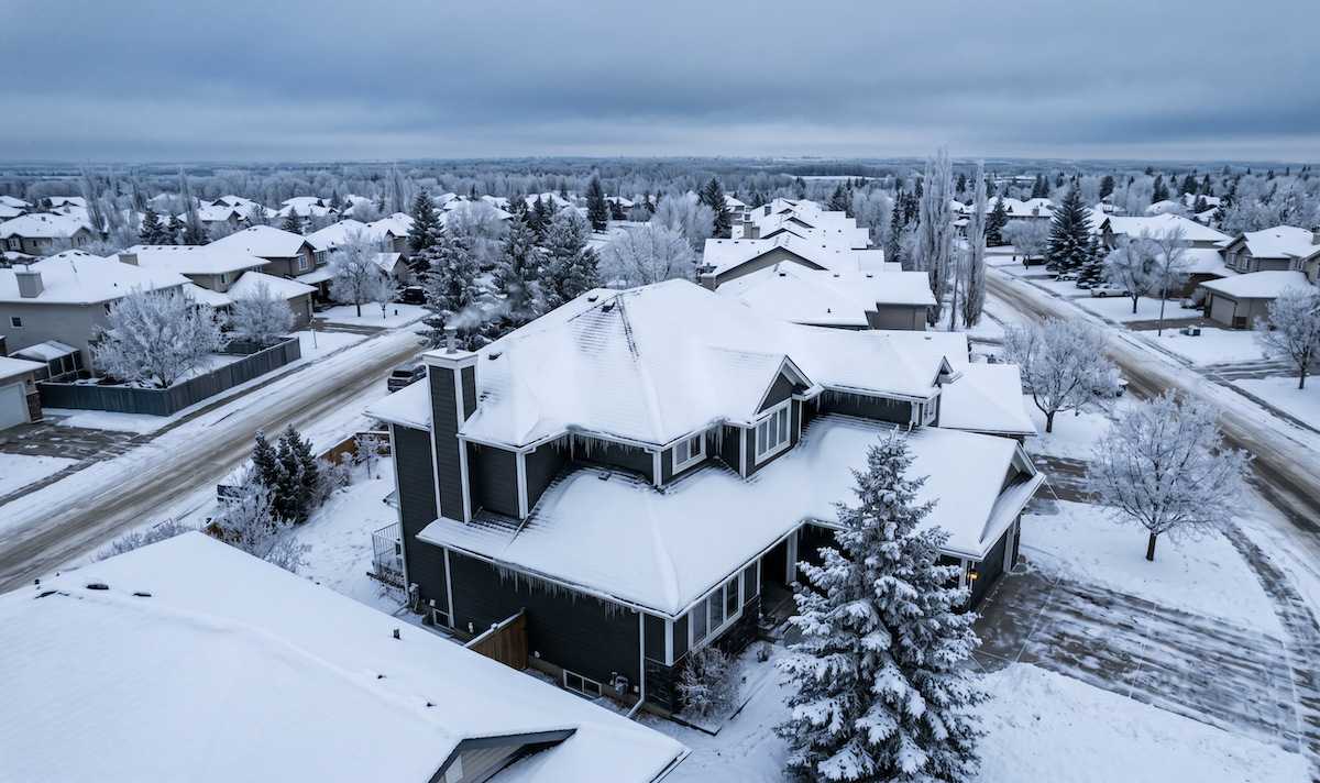 1f - Scherger Roofing - Scherger Roofing a snow-covered residential rooftop in Edmonton | scherger roofing | scherger roofing